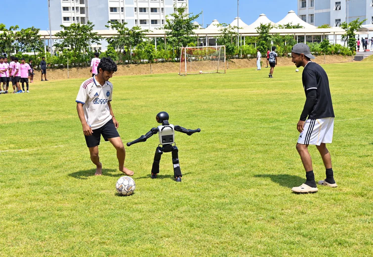 Students playing football at PCU